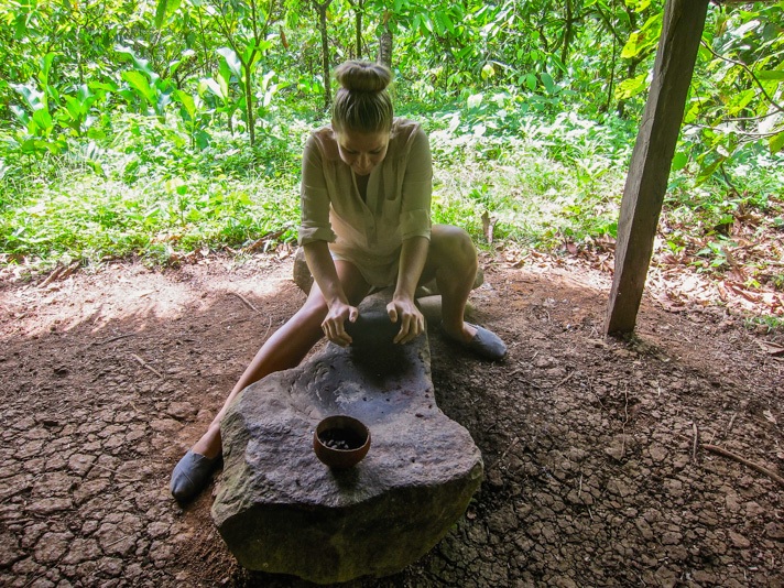 Grinding cacao into chocolate