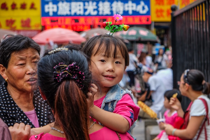 Little girl in China with sprouts