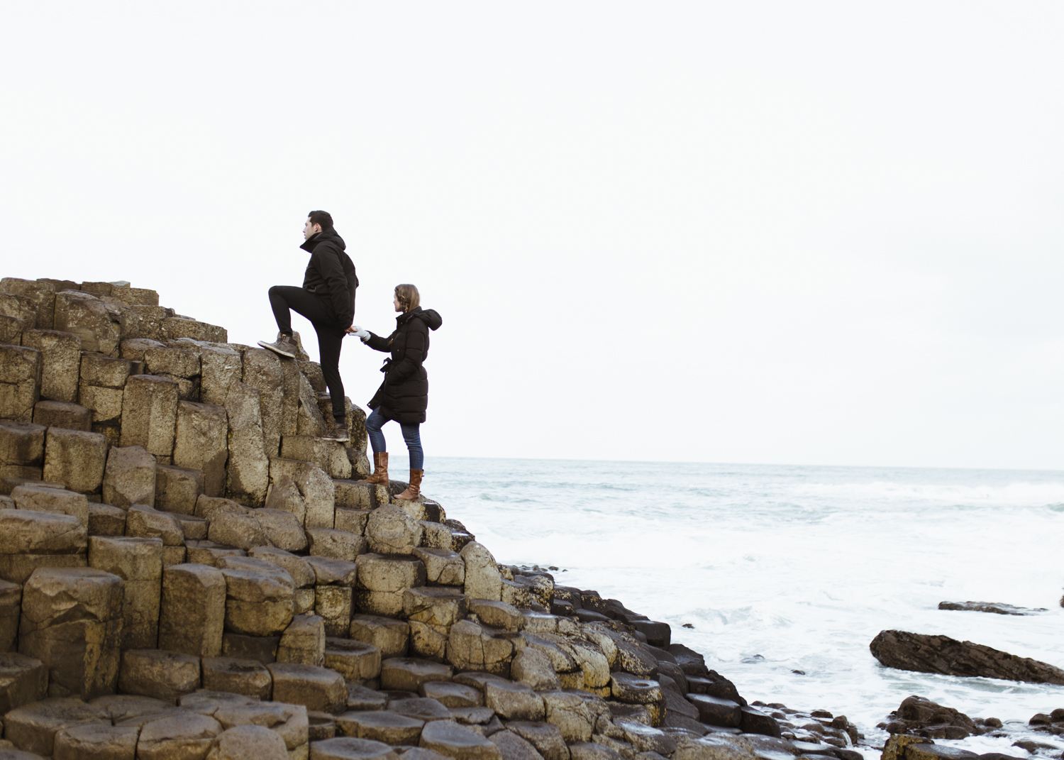 Climbing along Giants Causeway