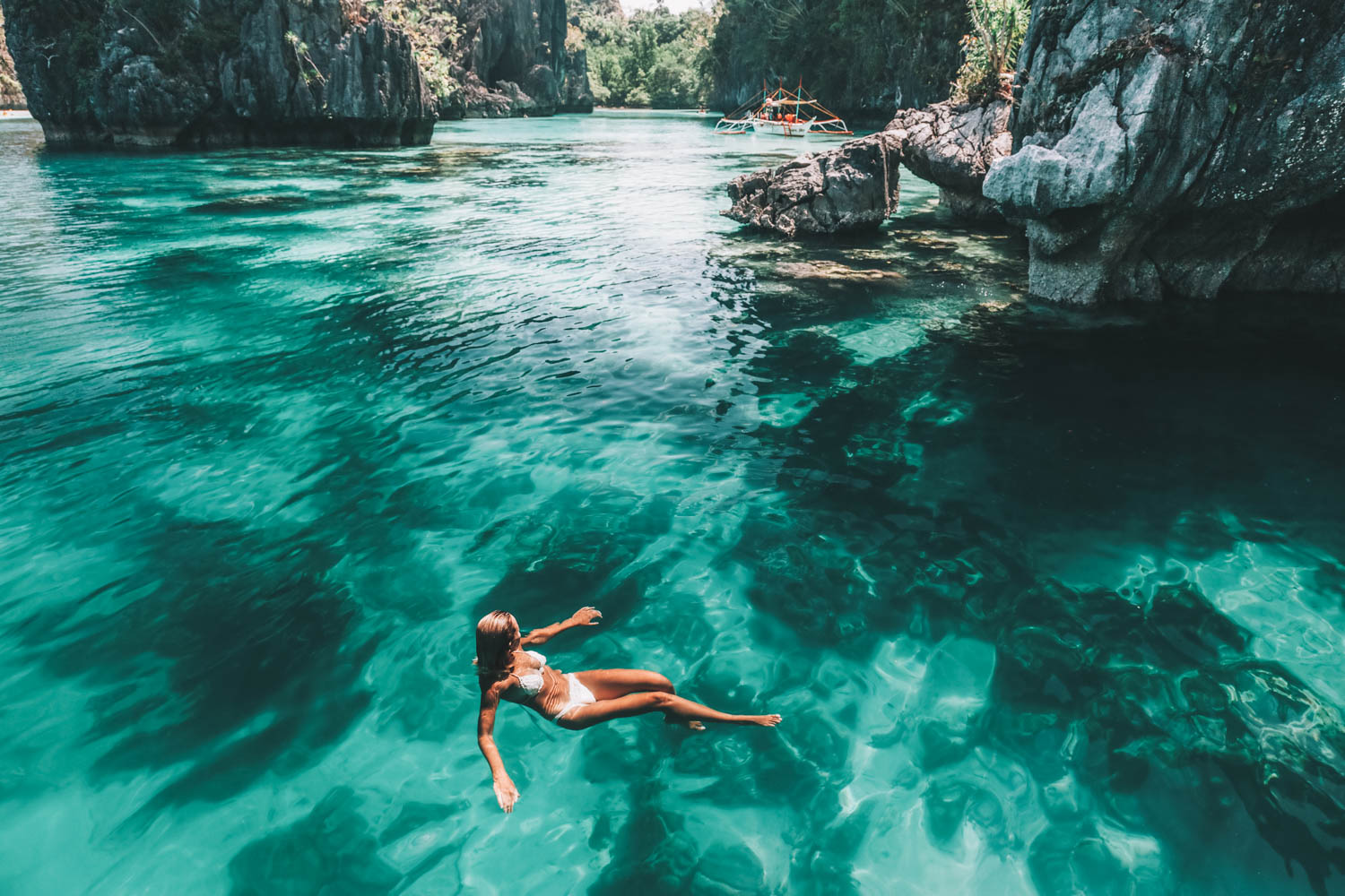 El Nido, Palawan, Philippines woman swimming water